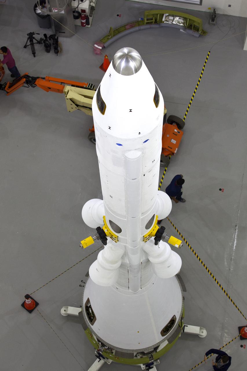 A fully functional Launch Abort System (LAS) is inside the Launch Abort System Facility (LASF) at NASA’s Kennedy Space Center in Florida on March 13, 2019. The LAS will be used for the Orion Ascent Abort-2 (AA-2) Flight Test, a full-stress test of the LAS, scheduled for spring 2019. AA-2 will launch from Space Launch Complex 46, carrying the LAS and a 22,000-pound Orion test vehicle to an altitude of 31,000 feet and traveling at more than 1,000 miles an hour. The test will verify the LAS can steer the crew module and astronauts aboard to safety in the event of an issue with the Space Launch System (SLS) rocket when the spacecraft is under the highest aerodynamic loads it will experience during a rapid climb into space. NASA's Orion and Exploration Ground Systems programs and contractors from Jacob's and Northrop Grumman in conjunction with the Air Force Space and Missile Center's Launch Operations branch are performing flight operations for AA-2.