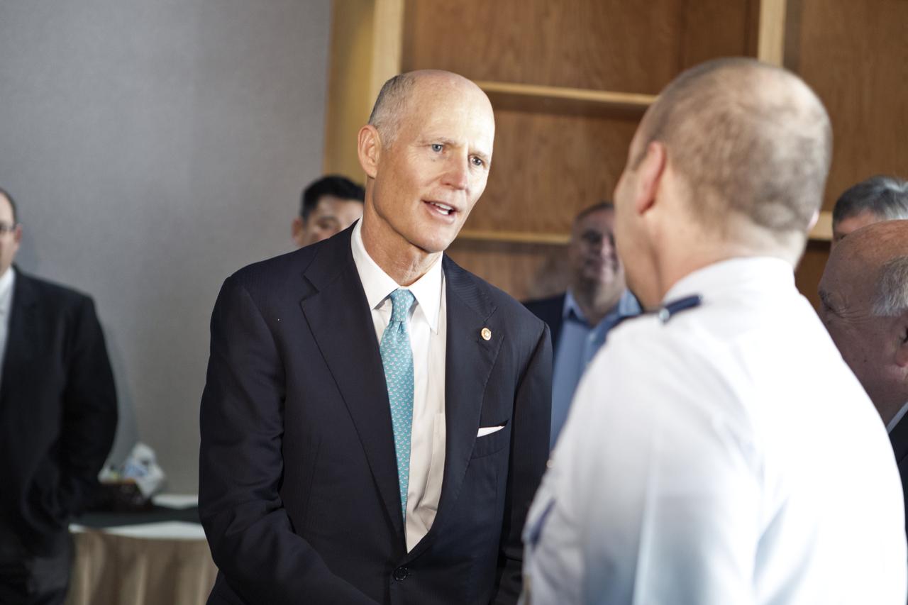 U.S. Sen. Rick Scott shakes hands with a multi-user spaceport partner inside the Kennedy Space Center Saturn V Conference Center prior to a roundtable discussion among Center Director Bob Cabana and center partners on March 15, 2019. The meeting was held to discuss the needs of the space center and Cape Canaveral Air Force Station.