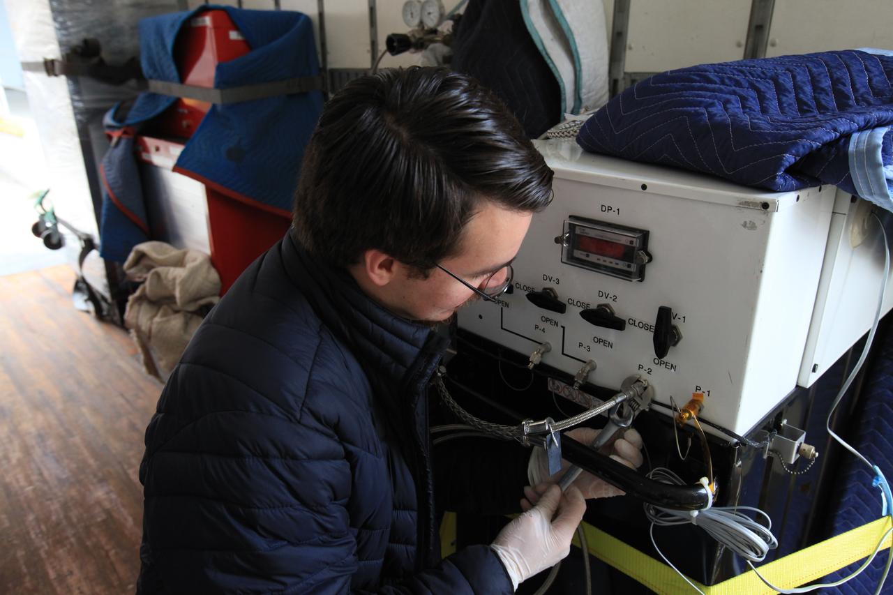 Kevin Mark, Orbiting Carbon Observatory 3 (OCO-3) purge engineer with NASA’s Jet Propulsion Laboratory, secures a separate fixture of OCO-3, stored apart from its payload container, on the truck transporting it from the Space Station Processing Facility high bay at the agency’s Kennedy Space Center in Florida to the SpaceX facility on March 18, 2019. The OCO-3 payload will be stowed in the trunk of SpaceX’s Dragon spacecraft, where it will launch aboard a Falcon 9 rocket on the company’s 17th Commercial Resupply Services mission to the International Space Station. Launch is scheduled for April 25, 2019, from Launch Complex 40 at Cape Canaveral Air Force Station. Once the payload reaches the station, it will be removed from Dragon and robotically installed on the exterior of the orbiting laboratory’s Japanese Experiment Module Exposed Facility Unit, where it will measure and map carbon dioxide from space to provide further understanding of the relationship between carbon and climate. 