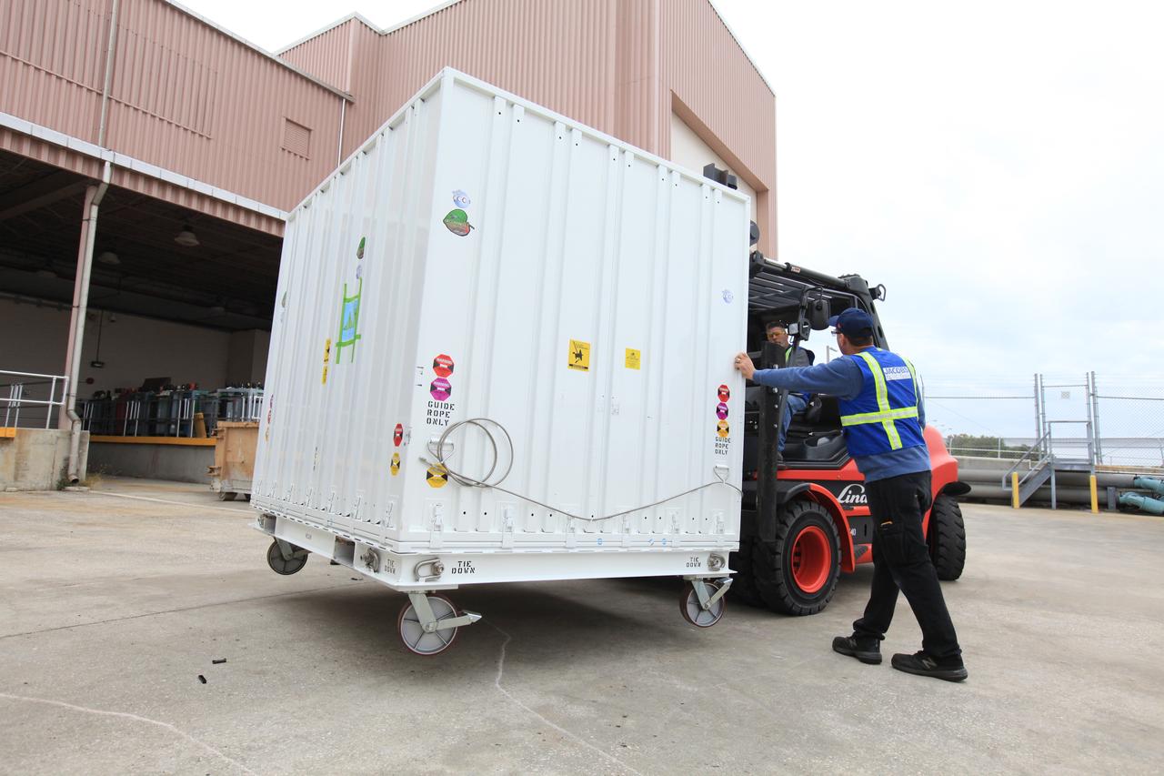 A forklift moves the transportation container carrying NASA’s Orbiting Carbon Observatory 3, or OCO-3, payload to a truck for its move from the Space Station Processing Facility high bay at the agency’s Kennedy Space Center in Florida to the SpaceX facility on March 18, 2019. The OCO-3 payload will be stowed in the trunk of SpaceX’s Dragon spacecraft, where it will launch aboard a Falcon 9 rocket on the company’s 17th Commercial Resupply Services mission to the International Space Station. Launch is scheduled for April 25, 2019, from Launch Complex 40 at Cape Canaveral Air Force Station. Once the payload reaches the station, it will be removed from Dragon and robotically installed on the exterior of the orbiting laboratory’s Japanese Experiment Module Exposed Facility Unit, where it will measure and map carbon dioxide from space to provide further understanding of the relationship between carbon and climate. 