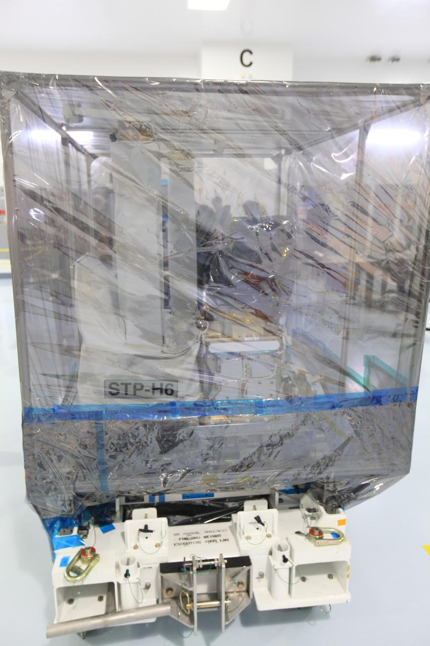 The Space Test Program-Houston 6 (STP-H6) payload is inside the Space Station Processing Facility high bay at NASA’s Kennedy Space Center in Florida on March 19, 2019. It is being prepared for its move to the SpaceX facility where it will be will be stowed in the trunk of the Dragon spacecraft for delivery to the International Space Station on SpaceX’s 17th Commercial Resupply Services mission (CRS-17) for NASA. STP-H6 is an x-ray communication investigation that will be used to perform a space-based demonstration of a new technology for generating beams of modulated x-rays. This technology may be useful for providing efficient communication to deep space probes, or communicating with hypersonic vehicles where plasma sheaths prevent traditional radio communications. CRS-17 is scheduled to launch from Space Launch Complex 40 on Cape Canaveral Air Force Station in late April. 