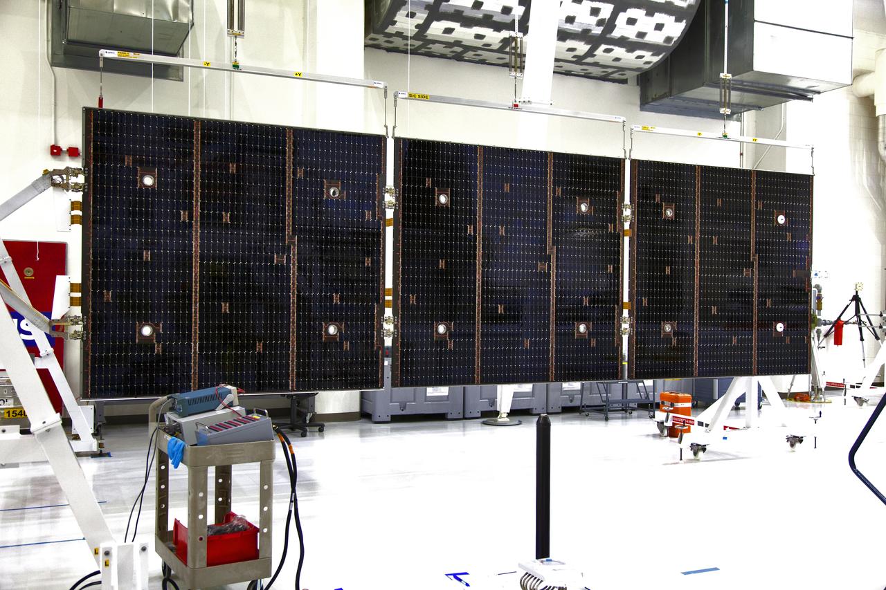 The solar array for the European Service Module that will serve as the powerhouse for Orion, is being prepared for Exploration Mission-1 (EM-1) inside the Neil Armstrong Operations and Checkout Building high bay on March 21, 2019, at NASA’s Kennedy Space Center in Florida. Orion will launch atop the Space Launch System rocket from Launch Pad 39B. The spacecraft will travel thousands of miles past the Moon on an approximately three-week test flight. Orion will return to Earth and splashdown in the Pacific Ocean off the coast of California, where it will be retrieved and returned to Kennedy.