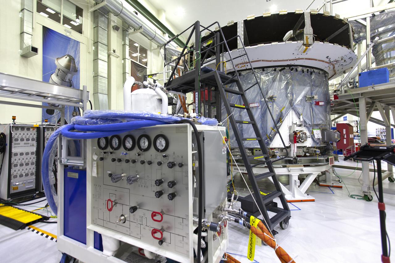 The European Service Module that will serve as the powerhouse for Orion on Exploration Mission-1 (EM-1), is in view on a work stand inside the Neil Armstrong Operations and Checkout Building high bay on March 21, 2019, at NASA’s Kennedy Space Center in Florida. For EM-1, Orion will launch atop the Space Launch System rocket from Launch Pad 39B. The spacecraft will travel thousands of miles past the Moon on an approximately three-week test flight. Orion will return to Earth and splashdown in the Pacific Ocean off the coast of California, where it will be retrieved and returned to Kennedy.