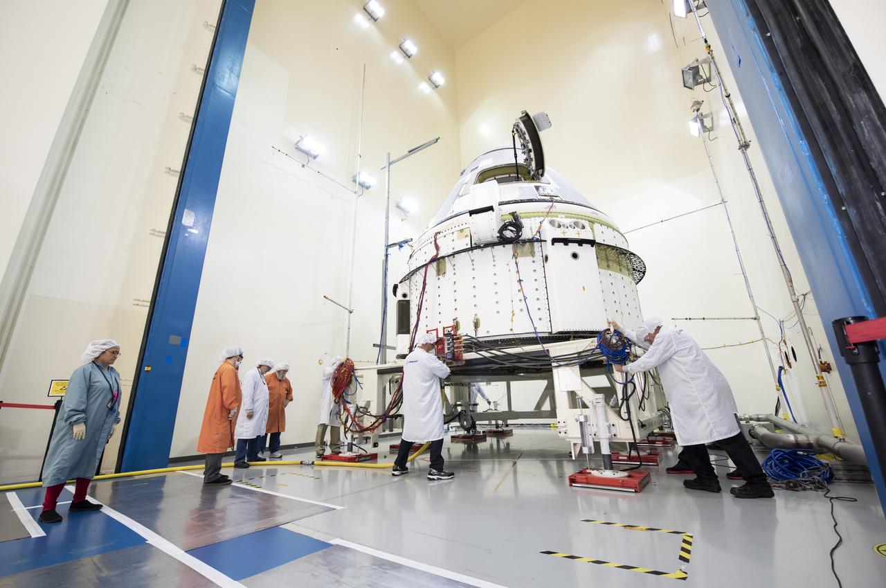 Technicians at Boeing’s Space Environment Test Facility in El Segundo, California position the CST-100 Starliner spacecraft inside an acoustics test chamber. This Starliner, slated to fly in Boeing’s Crew Flight Test (CFT), underwent an environmental qualification test campaign in March, experiencing rounds of acoustics vibration, thermal vacuum and electromagnetic interference and electromagnetic contamination testing. These tests prove Starliner’s design is capable of handling the harsh environments of launch, ascent and orbit and also prove that the electronics systems will operate in space and not interfere with other satellites or the International Space Station. CFT is Boeing’s crewed flight test of Starliner and part of NASA’s Commercial Crew Program, which will return human spaceflight launches into low-Earth orbit from U.S. soil.
