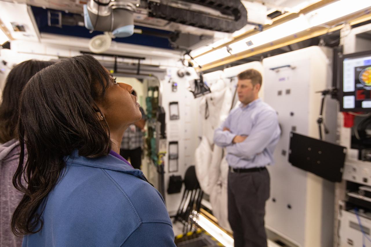 NASA began evaluating five habitat prototypes developed through NASA’s Next Space Exploration for Technologies Partnerships, or NextSTEP, to help engineers refine requirements for the design of an American-made deep space habitat for the Gateway. Lockheed Martin turned over its prototype to NASA, and testing began with crew on March 25, 2019, at Kennedy Space Center in Florida. Pictured inside the habitat prototype on March 26, 2019, at left is astronaut Stephanie Wilson. To her left, partially hidden is astronaut Shannon Walker. Astronauts are participating in the evaluations to provide their perspectives as those who may one day live aboard the lunar outpost, which would be located about 250,000 miles from Earth. Ground prototypes developed by Bigelow Aerospace, Boeing, Northrop Grumman, and Sierra Nevada Corporation will be tested in the future at various facilities across the country. A sixth company, NanoRacks, plans to develop a prototype as well.
