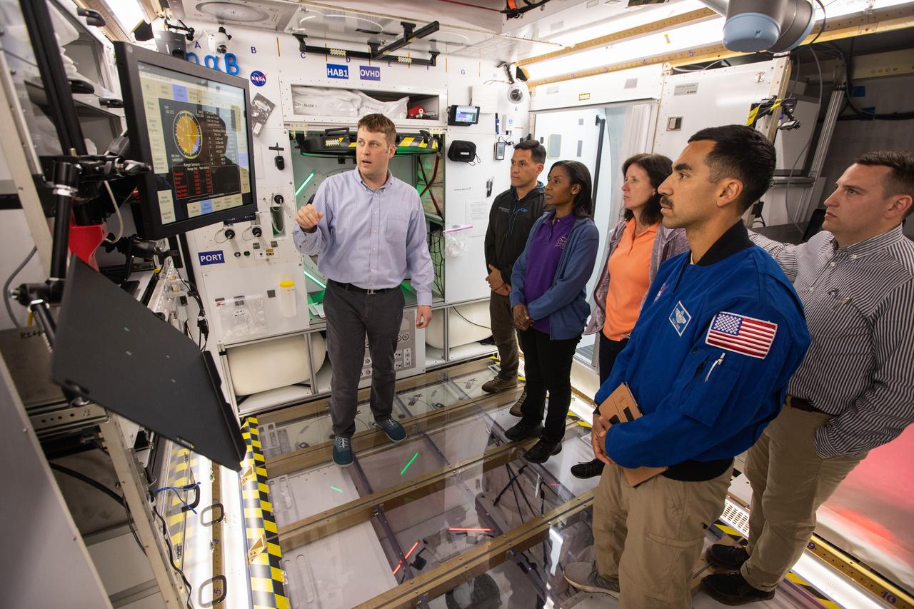 NASA began evaluating five habitat prototypes developed through NASA’s Next Space Exploration for Technologies Partnerships, or NextSTEP, to help engineers refine requirements for the design of an American-made deep space habitat for the Gateway. Lockheed Martin turned over its prototype to NASA, and testing began with crew on March 25, 2019, at Kennedy Space Center in Florida. Pictured inside the habitat prototype on March 26, 2019, beginning second from left are astronauts Frank Rubio, Raja Shari, Stephanie Wilson and Shannon Walker. Astronauts are participating in the evaluations to provide their perspectives as those who may one day live aboard the lunar outpost, which would be located about 250,000 miles from Earth. Ground prototypes developed by Bigelow Aerospace, Boeing, Northrop Grumman, and Sierra Nevada Corporation will be tested in the future at various facilities across the country. A sixth company, NanoRacks, plans to develop a prototype as well.