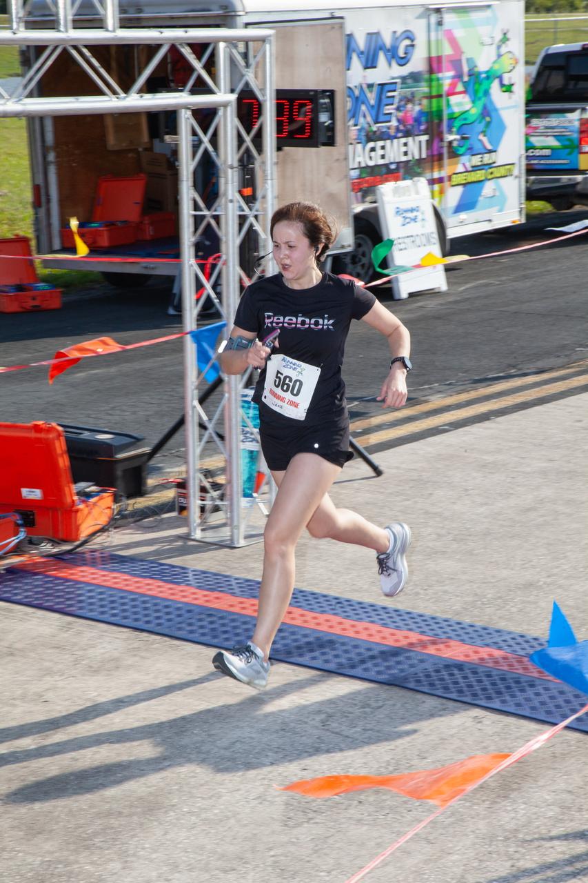 A participant crosses the finish line of Kennedy Space Center’s Walk Run on March 26, 2019. Part of Kennedy’s Safety and Health Days, the annual event takes place at the Florida spaceport’s Shuttle Landing Facility runway and offers employees and guests the chance to partake in a two-mile walk or run, a 5K or a 10K. 