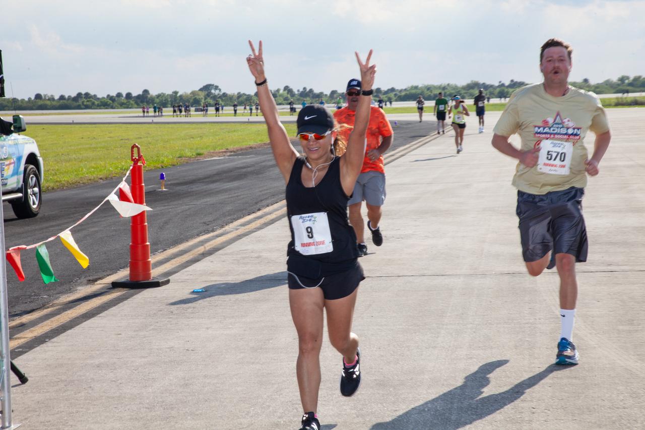 Kennedy Space Center employees and guests cross the finish line during the Florida spaceport’s annual KSC Walk Run on March 26, 2019. Part of Kennedy’s Safety and Health Days, the event takes place at the Shuttle Landing Facility runway and offers participants the chance to partake in a two-mile walk or run, a 5K or a 10K. 