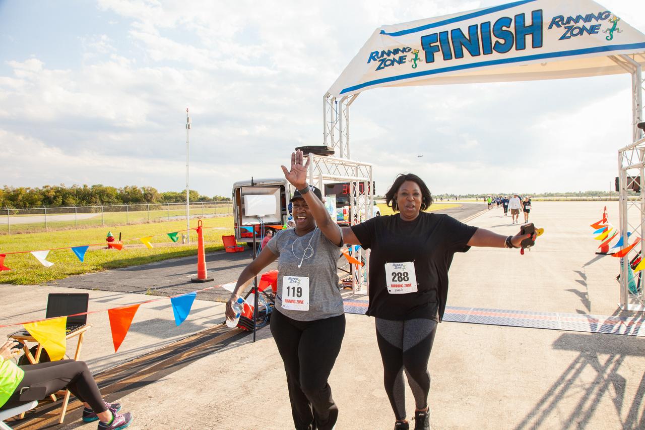 Participants cross the finish line of Kennedy Space Center’s Walk Run on March 26, 2019. Part of Kennedy’s Safety and Health Days, the annual event takes place at the Florida spaceport’s Shuttle Landing Facility runway and offers employees and guests the chance to partake in a two-mile walk or run, a 5K or a 10K. 