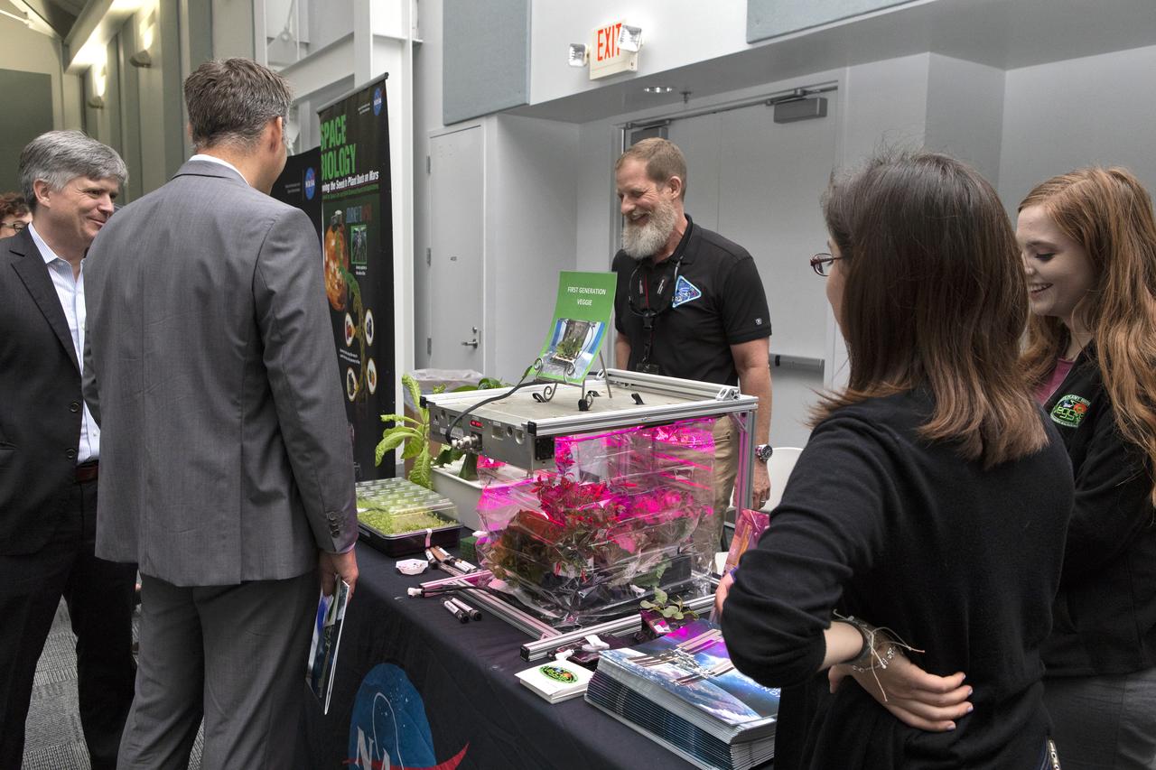 Guests visit with a representative from Exploration Research and Technology during NASA Kennedy Space Center Director Bob Cabana’s update to community leaders, business executives, partners, educators and government leaders March 29, 2019, at the Kennedy Space Center Visitor Complex in Florida. Cabana’s presentation covered recent accomplishments and future plans for Kennedy-led programs, including the Commercial Crew Program, Exploration Ground Systems, Launch Services Program, Exploration Research and Technology, and Center Planning and Development. After the presentation, guests had the opportunity to ask questions and visit displays from the programs and some of the commercial partners.