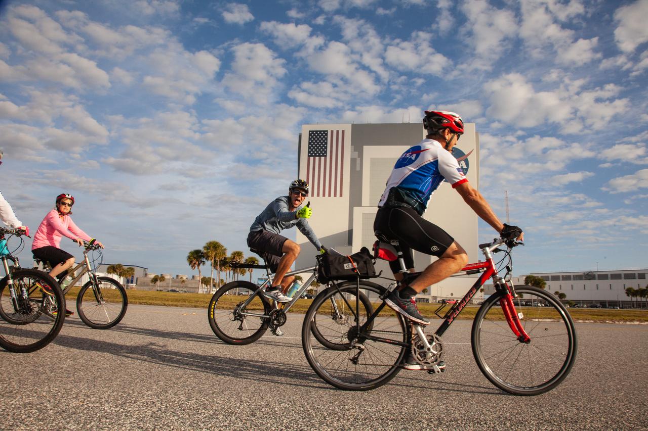 Cyclists ride past the Vehicle Assembly Building (VAB) during Kennedy Space Center’s annual Tour de KSC. The bicycle tour took place March 30, giving Kennedy employees and guests the opportunity to choose from three different routes that ranged from seven to 33 miles along some of the Florida spaceport’s most notable facilities such as the VAB, the Shuttle Landing Facility and historic Launch Pad 39A, among others.