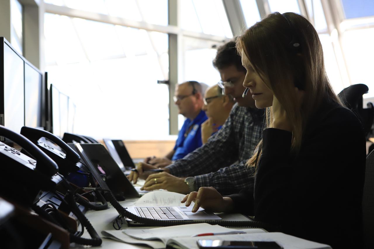 Engineers with NASA and contractor Jacobs monitor their consoles during a countdown demonstration event of cryogenic propellant loading April 12, 2019, inside Firing Room 2 in the Launch Control Center at NASA’s Kennedy Space Center in Florida. The practice simulation involved loading of liquid hydrogen and liquid oxygen into the Space Launch System rocket’s core and upper stages to prepare for Exploration Mission-1 (EM-1). During the tanking exercise, the team worked through surprise issues in real-time. The practice countdown events are training opportunities coordinated by EM-1 Launch Director Charlie Blackwell-Thompson with Exploration Ground Systems.