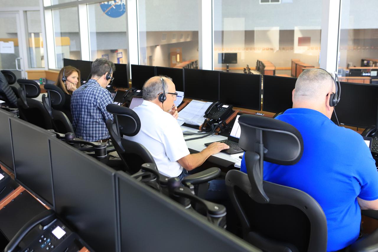 Engineers with NASA and contractor Jacobs monitor their consoles during a countdown demonstration event of cryogenic propellant loading April 12, 2019, inside Firing Room 2 in the Launch Control Center at NASA’s Kennedy Space Center in Florida. The practice simulation involved loading of liquid hydrogen and liquid oxygen into the Space Launch System rocket’s core and upper stages to prepare for Exploration Mission-1 (EM-1). During the tanking exercise, the team worked through surprise issues in real-time. The practice countdown events are training opportunities coordinated by EM-1 Launch Director Charlie Blackwell-Thompson with Exploration Ground Systems.