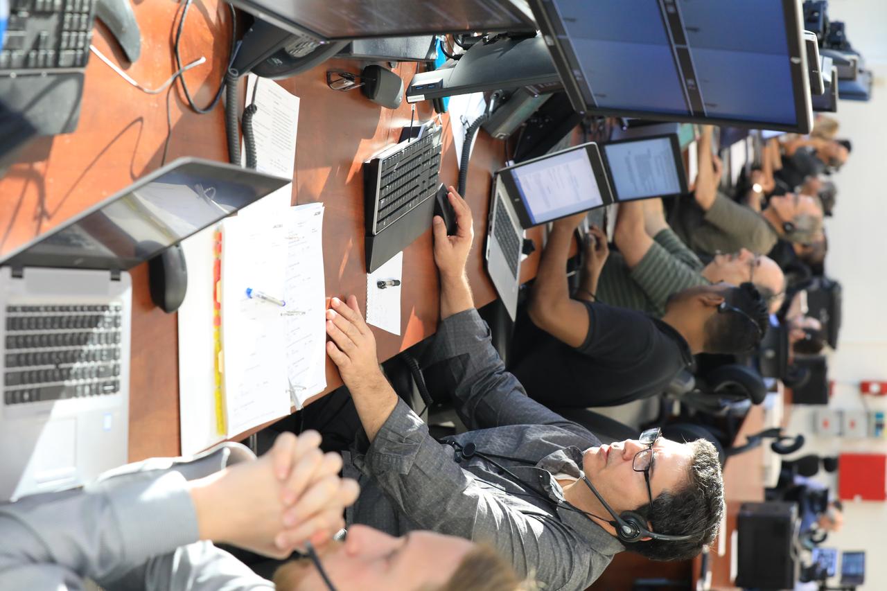 Engineers with NASA and contractor Jacobs monitor their consoles during a countdown demonstration event of cryogenic propellant loading April 12, 2019, inside Firing Room 2 in the Launch Control Center at NASA’s Kennedy Space Center in Florida. The practice simulation involved loading of liquid hydrogen and liquid oxygen into the Space Launch System rocket’s core and upper stages to prepare for Exploration Mission-1 (EM-1). During the tanking exercise, the team worked through surprise issues in real-time. The practice countdown events are training opportunities coordinated by EM-1 Launch Director Charlie Blackwell-Thompson with Exploration Ground Systems.