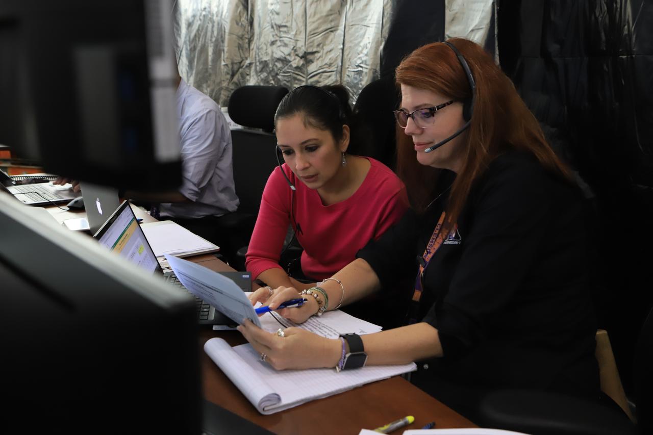 Charlie Blackwell-Thompson, right, Exploration Mission-1 (EM-1) launch director, reviews procedures during a countdown demonstration event of cryogenic propellant loading April 12, 2019, inside Firing Room 2 in the Launch Control Center at NASA’s Kennedy Space Center in Florida. The practice simulation involved loading of liquid hydrogen and liquid oxygen into the Space Launch System rocket’s core and upper stages to prepare for EM-1. During the tanking exercise, the team worked through surprise issues in real-time. The practice countdown events are training opportunities coordinated by Blackwell-Thompson with Exploration Ground Systems.