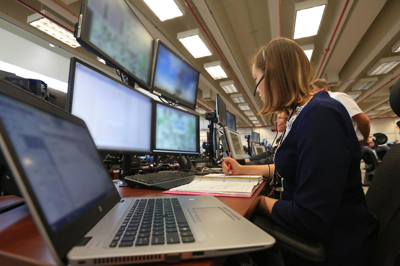 Engineers with NASA and contractor Jacobs monitor their consoles during a countdown demonstration event of cryogenic propellant loading April 12, 2019, inside Firing Room 2 in the Launch Control Center at NASA’s Kennedy Space Center in Florida. The practice simulation involved loading of liquid hydrogen and liquid oxygen into the Space Launch System rocket’s core and upper stages to prepare for Exploration Mission-1 (EM-1). During the tanking exercise, the team worked through surprise issues in real-time. The practice countdown events are training opportunities coordinated by EM-1 Launch Director Charlie Blackwell-Thompson with Exploration Ground Systems.