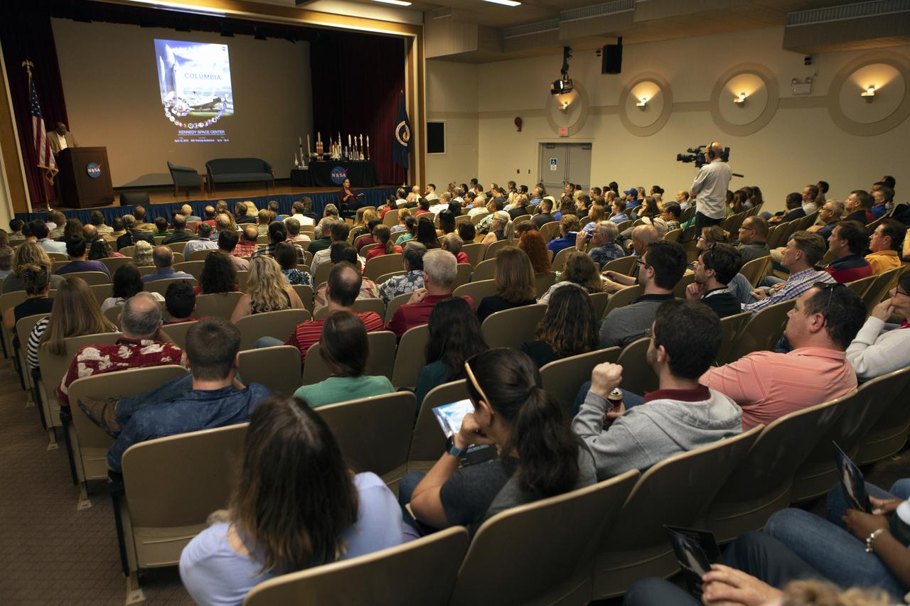 NASA civil service and contractor employees and guests gather in Kennedy Space Center’s Training Auditorium on April 12, 2019, for “Columbia: The Mission Continues,” an event organized by the Apollo Challenger Columbia Lessons Learned Program (ACCLLP). The event is part of the Space Shuttle Columbia national tour and took place on the 38th anniversary of STS-1, the first orbital spaceflight of NASA’s Space Shuttle Program. The tour launched at Kennedy and will make its way to each of the 10 NASA centers.