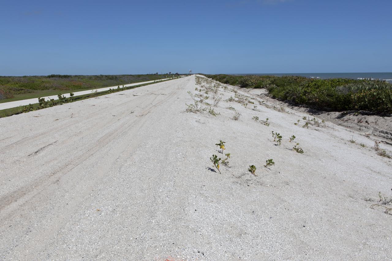 Restoration efforts are underway to the dunes at the north beaches at NASA’s Kennedy Space Center in Florida in this view on April 15, 2019. About 450,000 cubic yards of beach-quality sand, tested for compatibility, was transported to the space center’s beaches. Once the dune is built up, native coastal vegetation will be replanted, helping to stabilize the dune and offer a habitat for Kennedy’s coastal wildlife. Dunes are affected by beach erosion and storm surge from tropical events, such as hurricanes. Restoration began in spring 2018 and was targeted to be completed by April 2019.