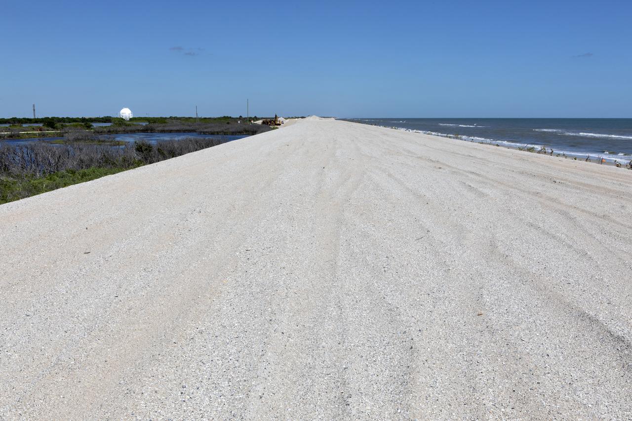 Restoration efforts are underway to the dunes at the north beaches at NASA’s Kennedy Space Center in Florida in this view on April 15, 2019. About 450,000 cubic yards of beach-quality sand, tested for compatibility, was transported to the space center’s beaches. Once the dune is built up, native coastal vegetation will be replanted, helping to stabilize the dune and offer a habitat for Kennedy’s coastal wildlife. Dunes are affected by beach erosion and storm surge from tropical events, such as hurricanes. Restoration began in spring 2018 and was targeted to be completed by April 2019.