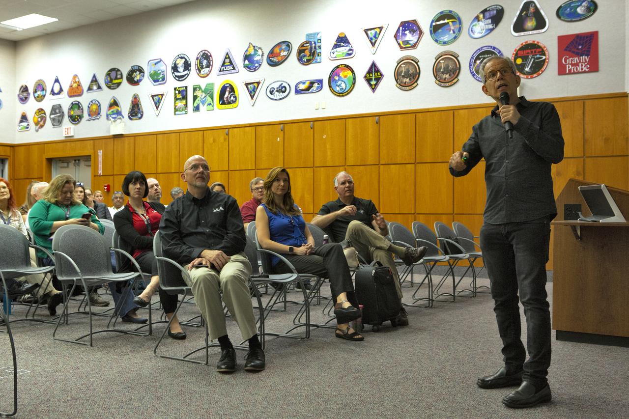 Dr. Humberto Campins from the University of Central Florida speaks to Kennedy Space Center employees in the Florida spaceport’s Neil Armstrong O&C Mission Briefing Room on April 16, 2019, to give a status update on NASA’s Origins, Spectral Interpretation, Resource Identification, Security-Regolith Explorer (OSIRIS-REx). The first U.S. mission to sample an asteroid, OSIRIS-REx launched from Cape Canaveral Air Force Station on Sept. 8, 2016 aboard a United Launch Alliance Atlas V rocket. Management of the launch service for OSIRIS-REx was the responsibility of NASA’s Launch Services Program, based at Kennedy.