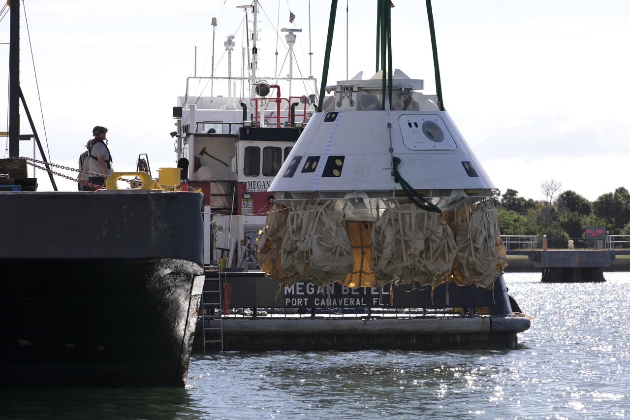 Rescue team members lower the Boeing CST-100 Starliner training capsule, known as Boiler Plate 3, into the water at the Army Wharf at Cape Canaveral Air Force Station in Florida on April 16, 2019. The team is practicing crew rescue procedures in the unlikely event of an emergency resulting in a splashdown. NASA and the Department of Defense Human Space Flight Support Office Rescue Division conducted a search and rescue training exercise at the Army Wharf at Cape Canaveral Air Force Station in Florida on April 17, 2019. The teams practiced manually inflating uprighting airbags to lift the spacecraft to its upright position. This is the first at-sea exercise with the Starliner training capsule ahead of Boeing’s Crew Flight Test with astronauts targeted for later this year. During normal return scenarios, Boeing's Starliner will land on land in a safe zone of about 15 square miles in the Western United States. Throughout the commercial crew development phases with NASA, Boeing has performed dozens of qualification tests on its parachute and airbag systems simulating conditions on land and in the water. 