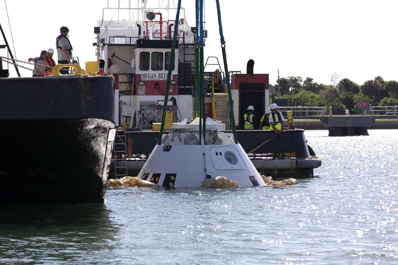 Rescue team members are using a Boeing CST-100 Starliner training capsule, known as Boiler Plate 3, to practice uprighting procedures in the unlikely event of an emergency resulting in a splashdown. NASA and the Department of Defense Human Space Flight Support Office Rescue Division conducted a search and rescue training exercise at the Army Wharf at Cape Canaveral Air Force Station in Florida on April 17, 2019. The manual uprighting airbags could be used to lift the spacecraft to its upright position. This is the first at-sea exercise with the Starliner training capsule ahead of Boeing’s Crew Flight Test with astronauts targeted for later this year. During normal return scenarios, Boeing's Starliner will land on land in a safe zone of about 15 square miles in the Western United States. Throughout the commercial crew development phases with NASA, Boeing has performed dozens of qualification tests on its parachute and airbag systems simulating conditions on land and in the water.