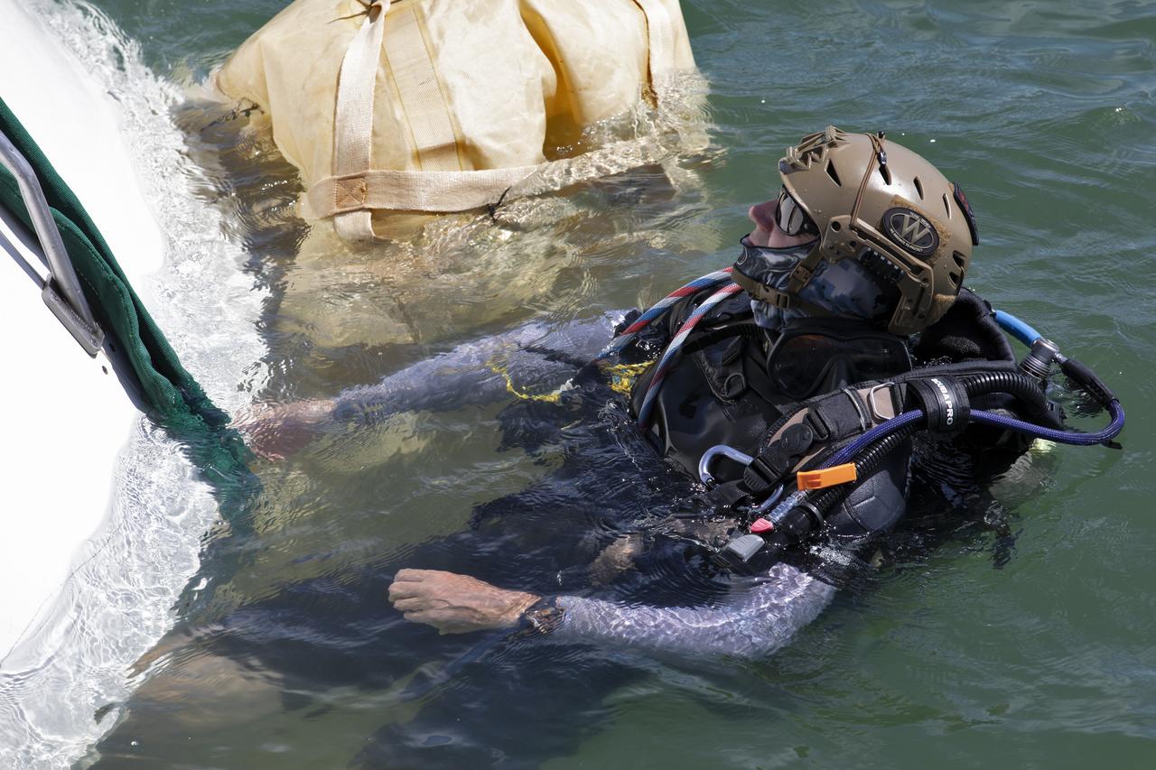 Rescue team members are using a Boeing CST-100 Starliner training capsule, known as Boiler Plate 3, to practice uprighting procedures in the unlikely event of an emergency resulting in a splashdown. NASA and the Department of Defense Human Space Flight Support Office Rescue Division conducted a search and rescue training exercise at the Army Wharf at Cape Canaveral Air Force Station in Florida on April 17, 2019. The manual uprighting airbags could be used to lift the spacecraft to its upright position. This is the first at-sea exercise with the Starliner training capsule ahead of Boeing’s Crew Flight Test with astronauts targeted for later this year. During normal return scenarios, Boeing's Starliner will land on land in a safe zone of about 15 square miles in the Western United States. Throughout the commercial crew development phases with NASA, Boeing has performed dozens of qualification tests on its parachute and airbag systems simulating conditions on land and in the water. 