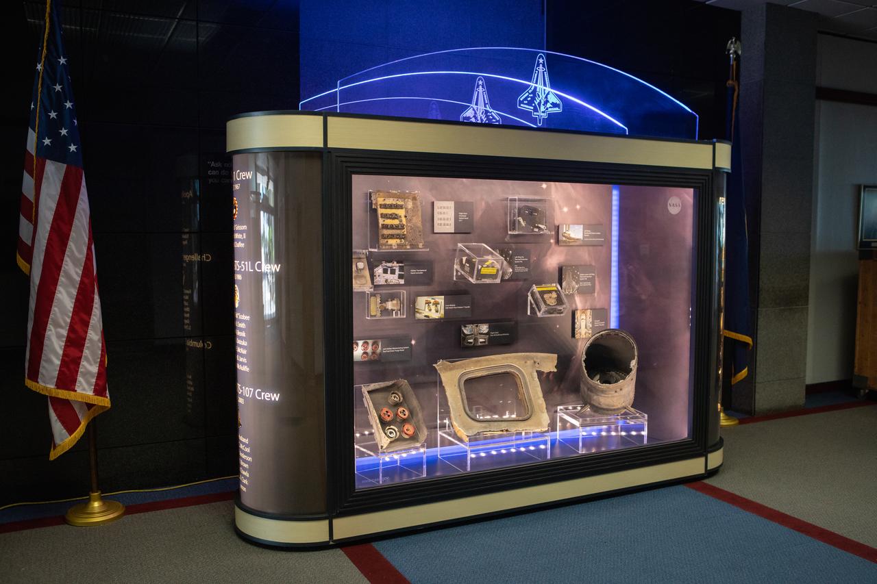 A display of artifacts featuring nine items recovered from the STS-107 tragedy that occurred Feb. 1, 2003, is shown in the old Headquarters Building at Kennedy Space Center. The powerful exhibit can now be viewed in the lobby of the Florida spaceport’s new Central Campus Building until June 10. The exhibit is part of the space shuttle Columbia national tour, which will make its way to all 10 NASA centers throughout the country.
