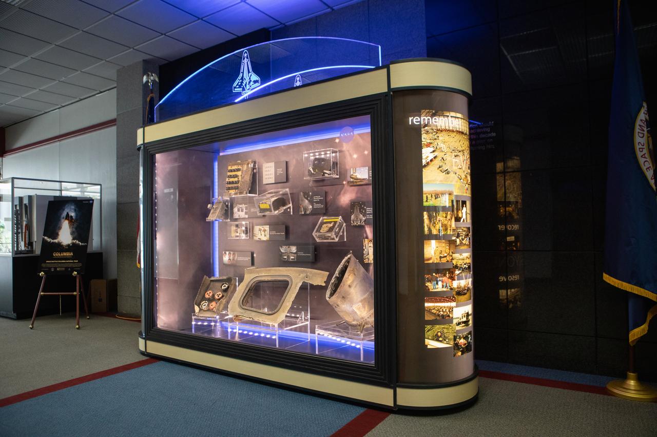 A display of artifacts featuring nine items recovered from the STS-107 tragedy that occurred Feb. 1, 2003, is shown in the old Headquarters Building at Kennedy Space Center. The powerful exhibit can now be viewed in the lobby of the Florida spaceport’s new Central Campus Building until June 10. The exhibit is part of the space shuttle Columbia national tour, which will make its way to all 10 NASA centers throughout the country.