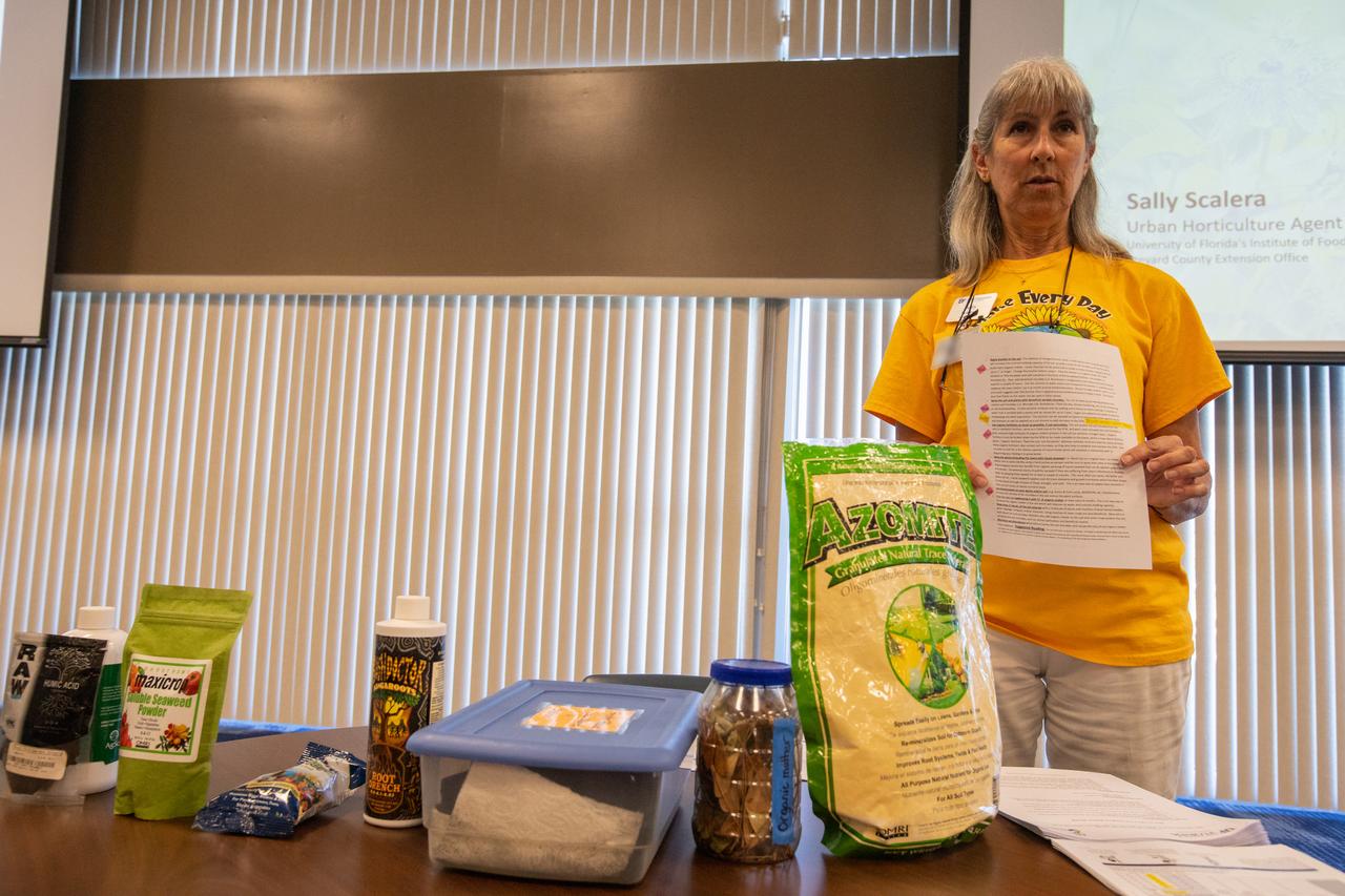 Sally Scalera, urban horticulture agent and master gardener coordinator from the University of Florida’s Institute of Food and Agricultural Sciences Brevard Extension Office, shows Kennedy Space Center employees some sustainable yard products available during her presentation on tips and tricks for a healthy yard and garden on April 24, 2019. Held inside the Florida spaceport’s Space Station Processing Facility Conference Center, Scalera also provided information on Florida-friendly landscaping practices. The lunch and learn was available for employees to attend as part of Kennedy’s Earth Day events.