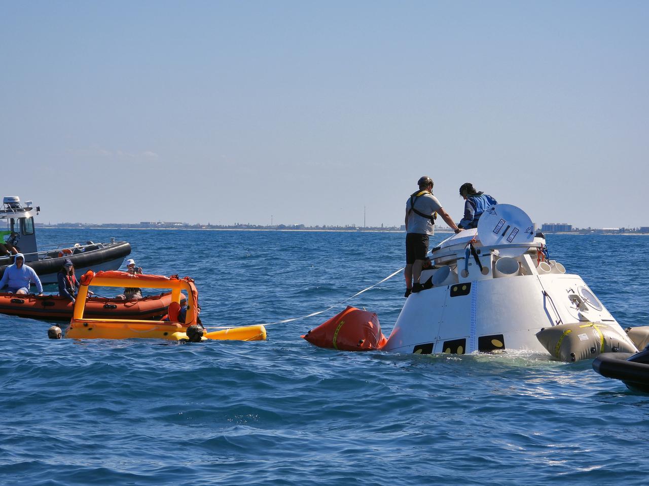 NASA astronauts Suni Williams and Barry “Butch” Wilmore rehearse the steps they would take to exit Boeing’s CST-100 Starliner spacecraft without assistance in the unlikely event of an emergency resulting in a splashdown. The training exercise, which occurred April 27, 2019, took place several miles off the coast of Cape Canaveral near NASA’s Kennedy Space Center in Florida. It included the astronauts unloading a rescue raft from inside the spacecraft, climbing out through a hatch at the top of the spacecraft, jumping into the Atlantic Ocean and boarding the raft. This open-ocean exercise provides the astronauts with the necessary training ahead of Boeing’s Crew Flight Test and subsequent missions. During normal return scenarios, Boeing’s Starliner will land in a safe zone of about 15 square miles in the Western United States. Throughout the commercial crew development phases with NASA, Boeing has performed dozens of qualification tests on its parachute and airbag systems simulating conditions on land and in the water. 