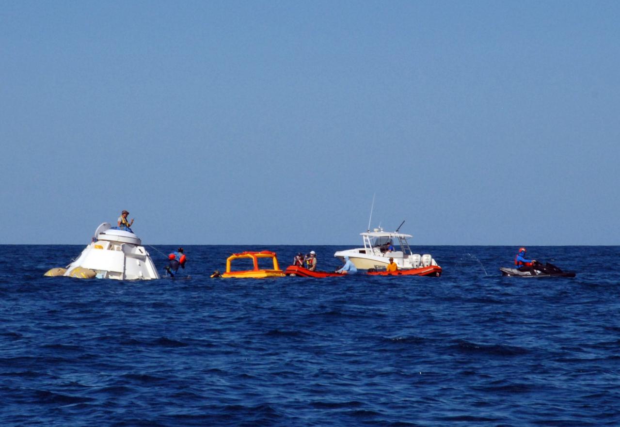 NASA astronauts Suni Williams and Barry “Butch” Wilmore rehearse the steps they would take to exit Boeing’s CST-100 Starliner spacecraft without assistance in the unlikely event of an emergency resulting in a splashdown. The training exercise, which occurred April 27, 2019, took place several miles off the coast of Cape Canaveral near NASA’s Kennedy Space Center in Florida. It included the astronauts unloading a rescue raft from inside the spacecraft, climbing out through a hatch at the top of the spacecraft, jumping into the Atlantic Ocean and boarding the raft. This open-ocean exercise provides the astronauts with the necessary training ahead of Boeing’s Crew Flight Test and subsequent missions. During normal return scenarios, Boeing’s Starliner will land in a safe zone of about 15 square miles in the Western United States. Throughout the commercial crew development phases with NASA, Boeing has performed dozens of qualification tests on its parachute and airbag systems simulating conditions on land and in the water.