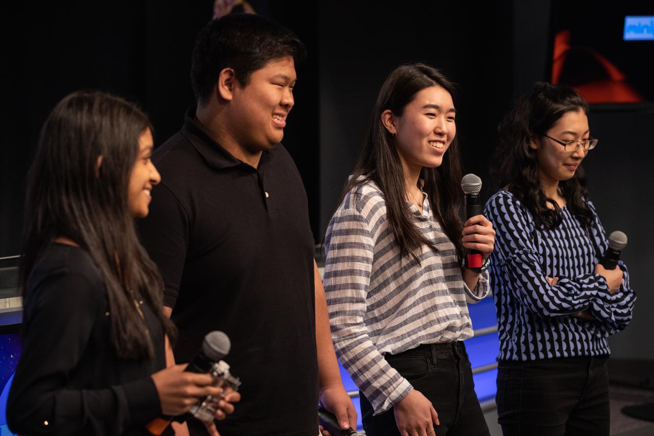 From left, high school student Aarthi Vijayakumar, MIT student David Li, and high school students Michelle Sung and Rebecca Li talk about their winning Genes in Space experiment for NASA during a What’s On Board science briefing to NASA Social participants at the agency’s Kennedy Space Center in Florida on April 29, 2019. The briefing was held for SpaceX’s 17th Commercial Resupply Services (CRS-17) mission to the International Space Station. NASA’s Orbiting Carbon Observatory-3 (OCO-3) and Space Test Program-Houston 6 (STP-H6) are two of the experiments that also will be delivered to the space station on CRS-17. The SpaceX Falcon 9 rocket and Dragon cargo module are scheduled to launch no earlier than May 3, 2019, from Space Launch Complex 40 on Cape Canaveral Air Force Station in Florida. 