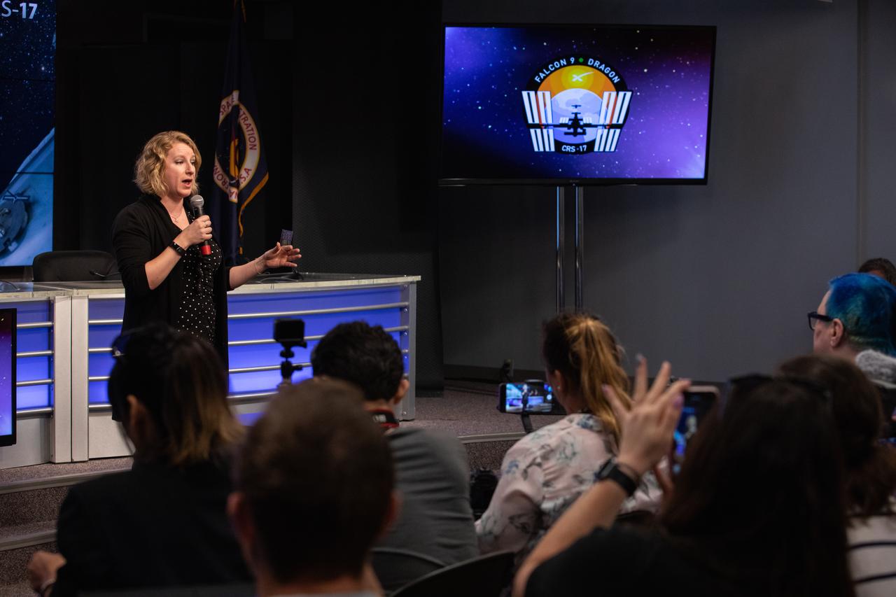 Dr. Lucy Low, with the National Institutes of Health, talks to NASA Social participants during a What’s On Board science briefing at NASA’s Kennedy Space Center in Florida on April 29, 2019. The briefing was held for SpaceX’s 17th Commercial Resupply Services (CRS-17) mission to the International Space Station. Low presented on the Tissue Chips in Space project that will test the ability of tissue chip technology to mimic how human organs work and reveal what effects microgravity has on tissue function. Headed to the space station will be lung and bone marrow chips, kidney chips, chips modeling the blood-brain barrier, and bone and cartilage chips. NASA’s Orbiting Carbon Observatory-3 (OCO-3) and Space Test Program-Houston 6 (STP-H6) are two of the experiments that also will be delivered to the space station on CRS-17. The SpaceX Falcon 9 rocket and Dragon cargo module are scheduled to launch no earlier than May 3, 2019, from Space Launch Complex 40 on Cape Canaveral Air Force Station in Florida.
