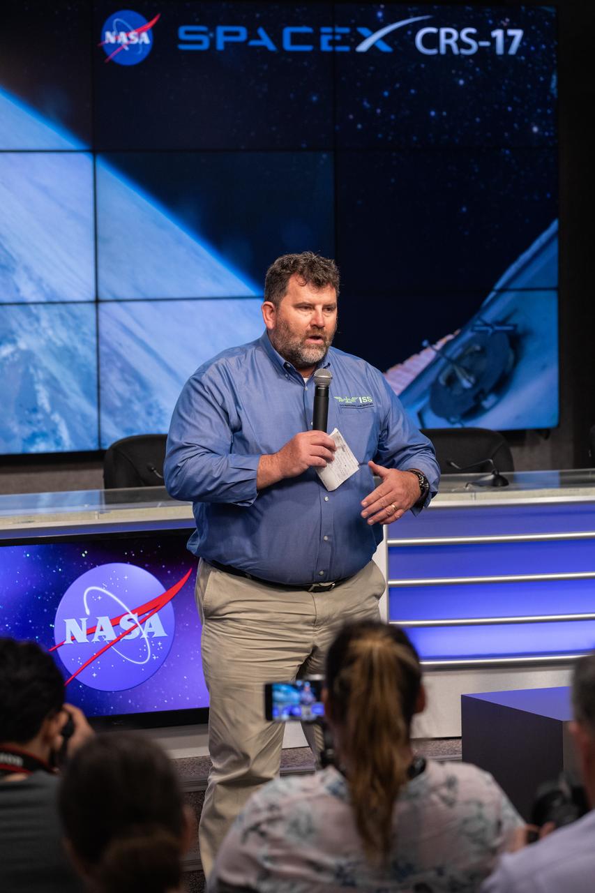 Mike Roberts, deputy chief scientist for the ISS Program at NASA’s Johnson Space Center in Houston, talks to NASA Social participants during a What’s On Board science briefing at the agency’s Kennedy Space Center in Florida on April 29, 2019. The briefing was held for SpaceX’s 17th Commercial Resupply Services (CRS-17) mission to the International Space Station. NASA’s Orbiting Carbon Observatory-3 (OCO-3) and Space Test Program-Houston 6 (STP-H6) are two of the experiments that will be delivered to the space station on CRS-17. The SpaceX Falcon 9 rocket and Dragon cargo module are scheduled to launch no earlier than May 3, 2019, from Space Launch Complex 40 on Cape Canaveral Air Force Station in Florida.