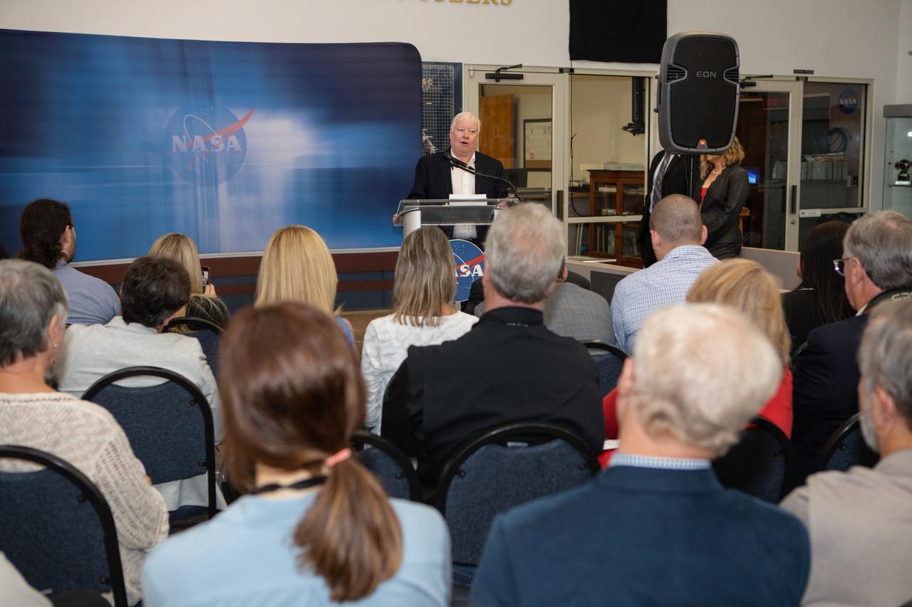 Todd Halvorson, former journalist for Florida Today, addresses a crowd of family and friends, current and former NASA officials, and space journalists after he is inducted as a 2019 Chronicler during a ceremony at Kennedy Space Center’s NASA News Center in Florida on May 3, 2019. Also honored as Chroniclers were journalist Jim Banke, radio broadcaster Vic Ratner and photographer Peter Cosgrove. The Chroniclers recognizes retirees of the news and communications business who have helped spread news of American space exploration from Kennedy for 10 years or more. The group of four was selected by a committee of their peers on March 25. Their names were engraved on brass strips and added to The Chroniclers wall display in the news center and were unveiled during the ceremony. 