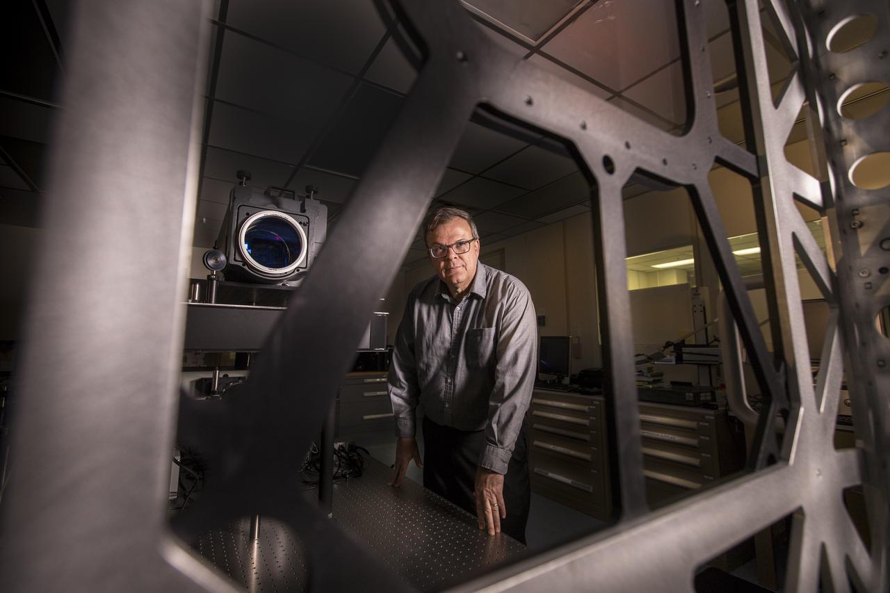 Mark Nurge, a physicist in Kennedy Space Center’s Applied Physics Lab, stands near a laser interferometer, which is used to determine if there are acceptable levels of distortion and imperfections in windows. Nurge recently completed optical metrology testing and evaluation of all flight windows on the Orion capsule for Artemis 1. The interferometer uses a laser source to do wavefront and transmission measurements, as well as evaluation of the color balance. Artemis 1 is an uncrewed flight that will pave the way for future crewed missions and enable future missions to the Moon, Mars, and beyond.