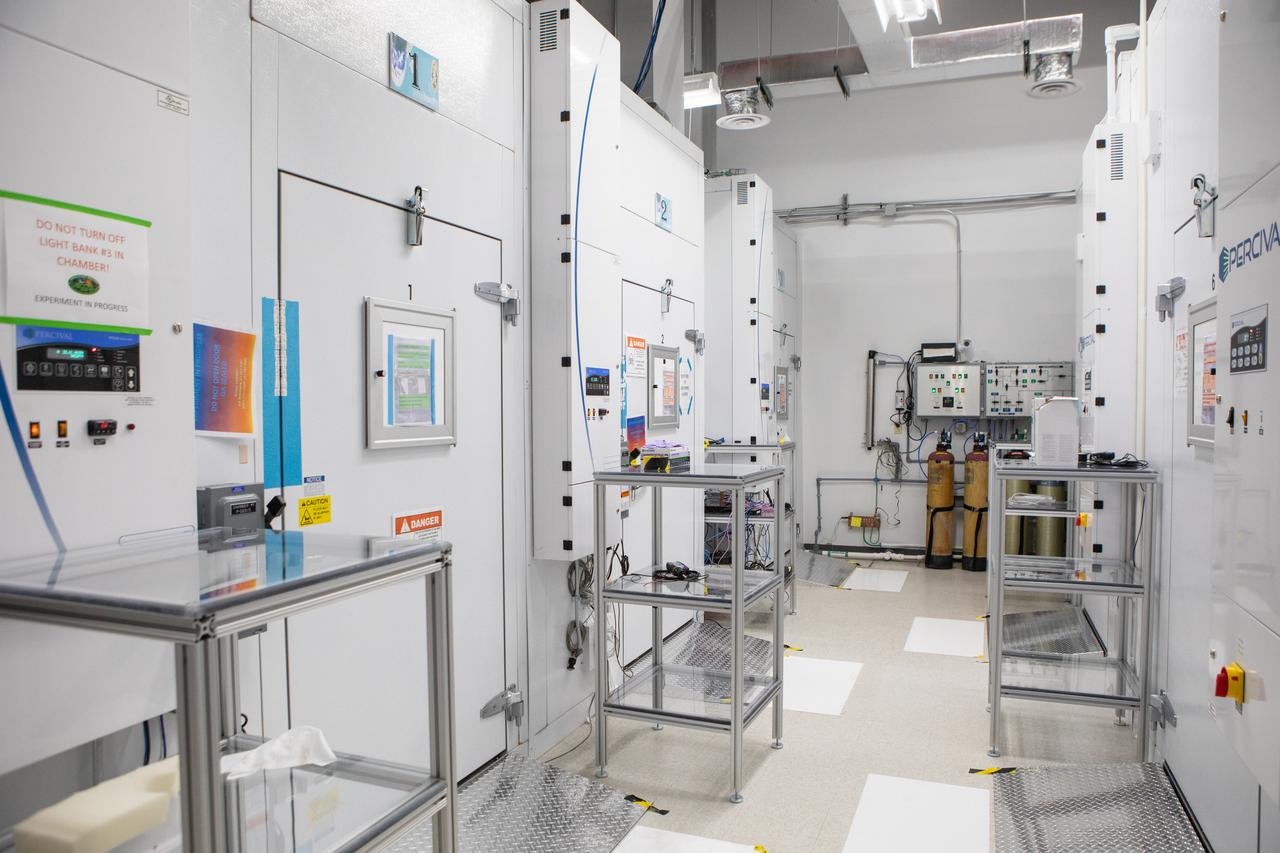 A walk-in experiment chamber for the Center for the Advancement of Science in Space (CASIS) is in view in the foreground inside a laboratory in the Space Station Processing Facility (SSPF) at NASA's Kennedy Space Center in Florida, on May 16, 2019. Further back is an experiment chamber for ground test flight experiments. The center is celebrating the SSPF’s 25th anniversary. The facility was built to process elements for the International Space Station. Now it is providing support for current and future NASA and commercial provider programs, including Commercial Resupply Services, Artemis 1, sending the first woman and next man to the Moon, and deep space destinations including Mars.