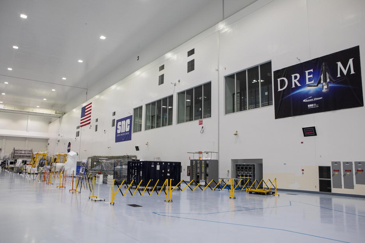 In view in this photograph, taken on May 16, 2019, is the area where the Sierra Nevada Corporation will process its Dream Chaser spacecraft in the high bay of the Space Station Processing Facility (SSPF) at NASA's Kennedy Space Center in Florida. The center is celebrating the SSPF’s 25th anniversary. The facility was built to process elements for the International Space Station. Now it is providing support for current and future NASA and commercial provider programs, including Commercial Resupply Services, Artemis 1, sending the first woman and next man to the Moon, and deep space destinations including Mars.