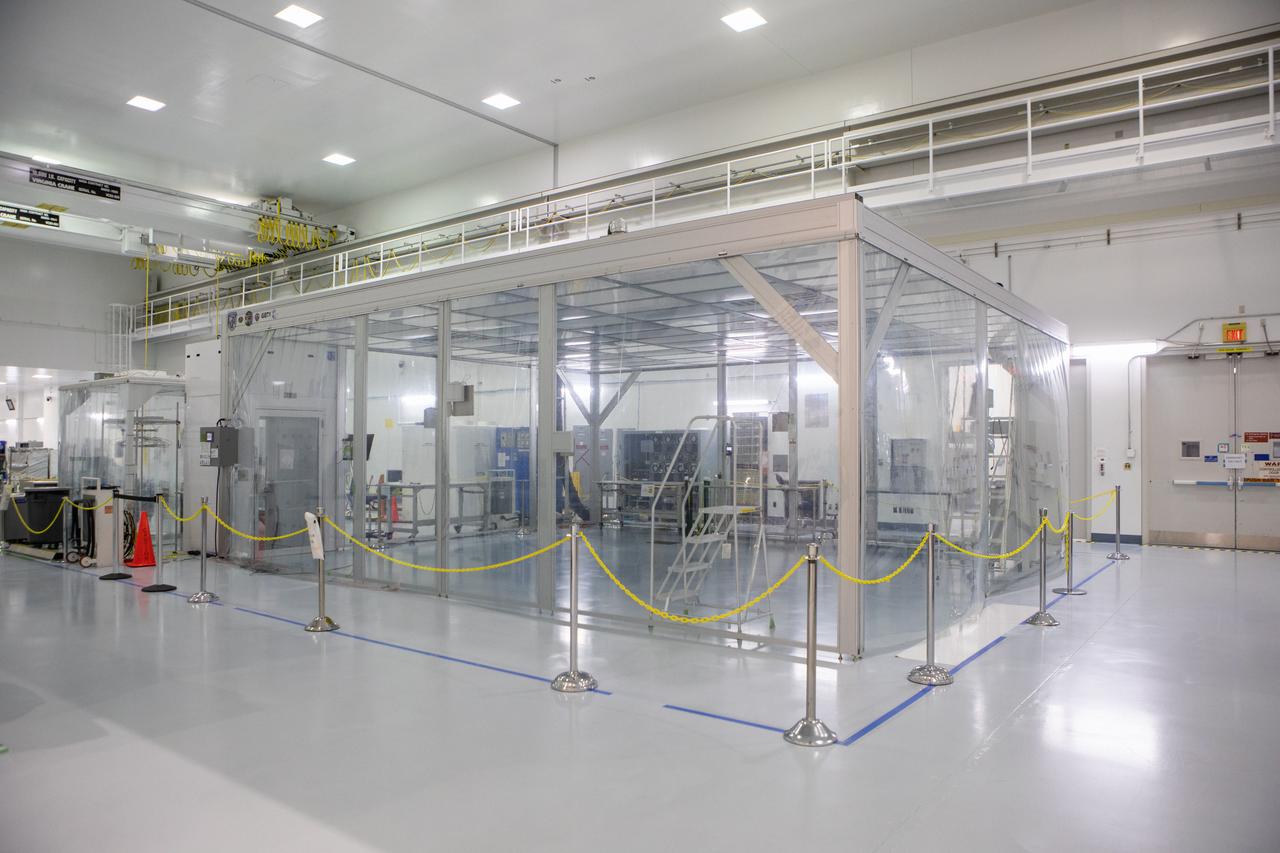 A clean room tent within the high bay of the Space Station Processing Facility (SSPF) at NASA's Kennedy Space Center in Florida, is in view on May 16, 2019. The extra clean environment is available for use by payload customers. The center is celebrating the SSPF’s 25th anniversary. The SSPF was built to process elements for the International Space Station. Now it is providing support for current and future NASA and commercial provider programs, including Commercial Resupply Services, Artemis 1, sending the first woman and next man to the Moon, and deep space destinations including Mars.
