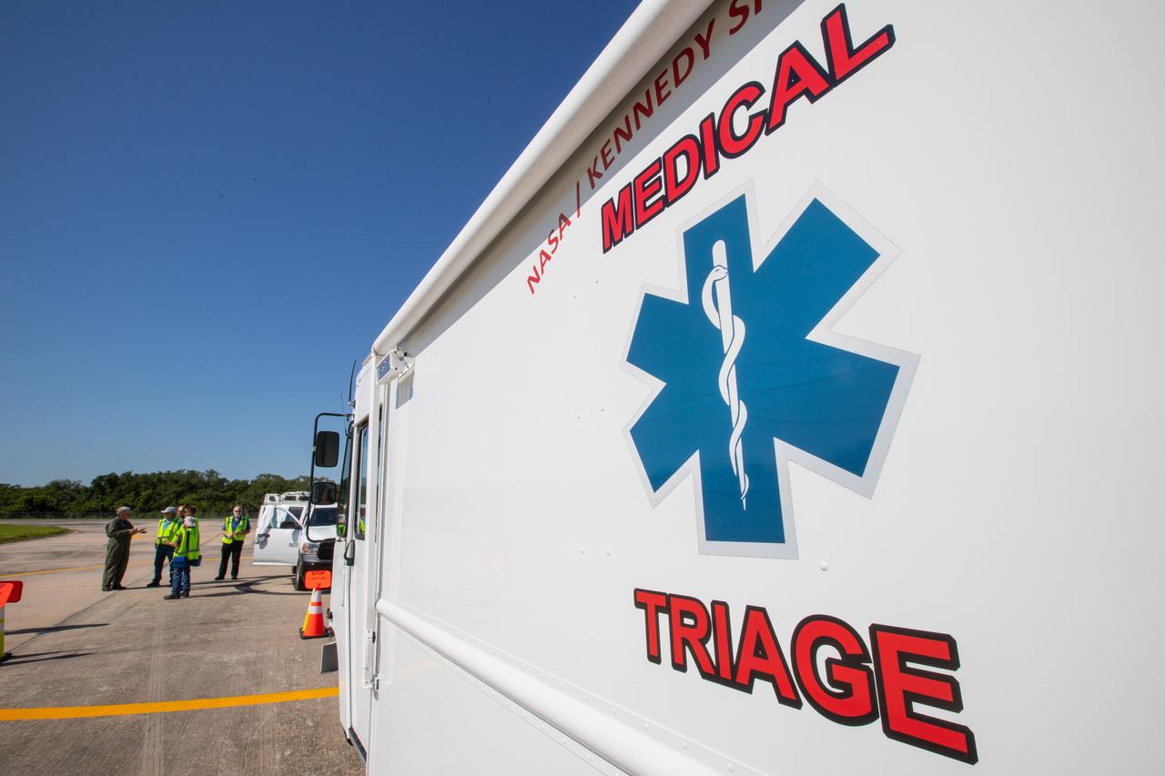 One of Kennedy Space Center’s medical triage vehicles stands at the ready during a medical support training course at the Florida spaceport’s Shuttle Landing Facility on May 17, 2019. Kennedy personnel and American Medical Response (AMR) contractor paramedics participated in the course, which was designed to familiarize the AMR paramedics with the center’s Triage Forces deployment, including medical team members, fire/rescue personnel, environmental health specialists and flight operations crew members, as well as a helicopter, Mine Resistant Ambush Protected (MRAP) tactical vehicle, fire pumper truck and triage vehicles. The AMR paramedics will assist the agency in contingency planning for the return of human spaceflight from Kennedy.