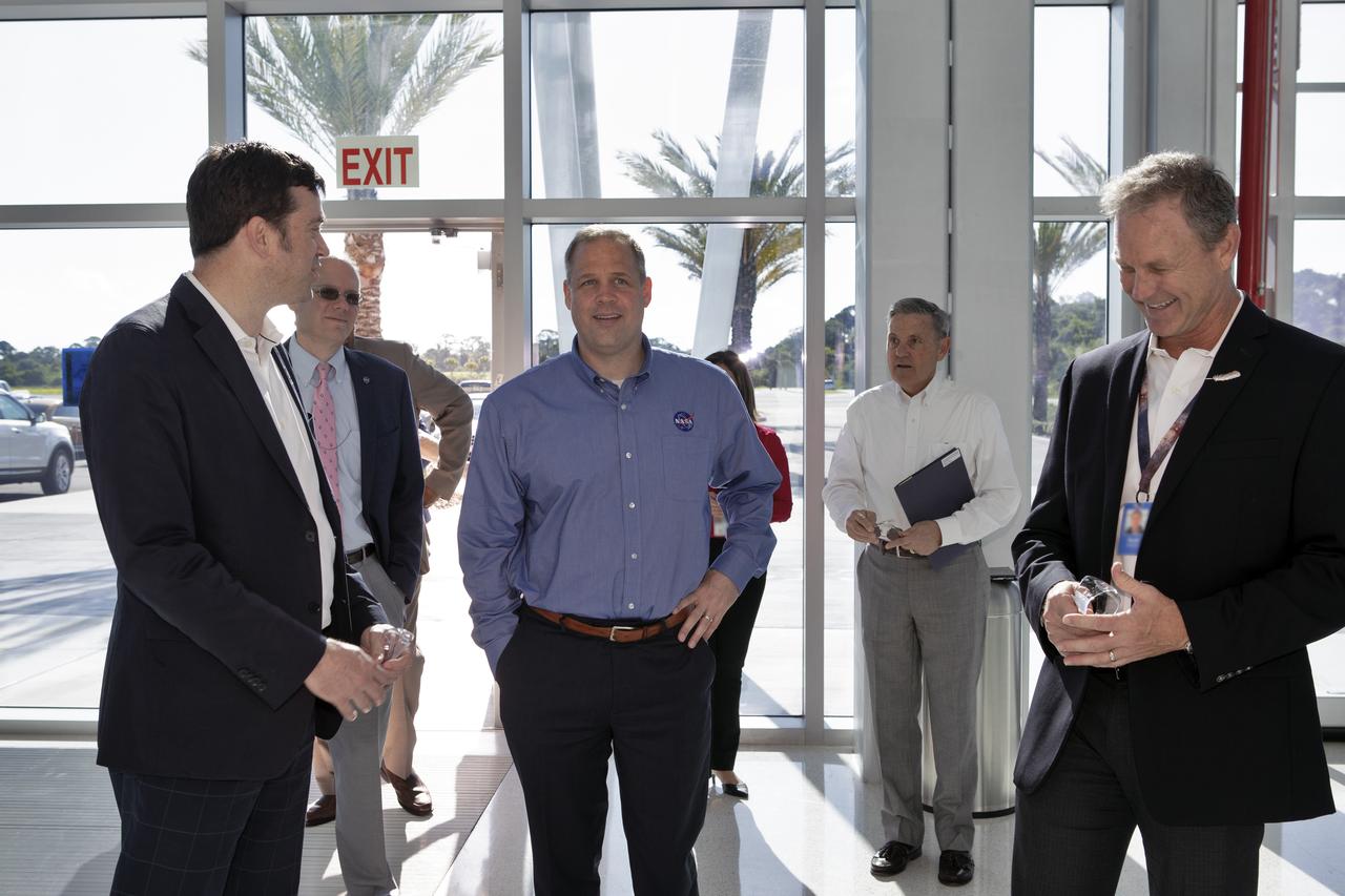 NASA Administrator Jim Bridenstine, third from left, arrives at the Blue Origin facilities near the agency’s Kennedy Space Center in Florida on May 23, 2019. Second from right is Kennedy Space Center Director Bob Cabana. The toured the facilities and viewed the New Shepard booster and crew capsule that flew to space and back five times.