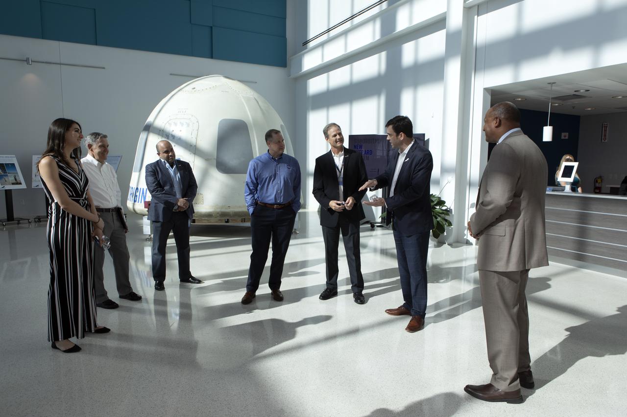 NASA Administrator Jim Bridenstine, fourth from left, tours the Blue Origin facilities near the agency’s Kennedy Space Center in Florida on May 23, 2019. Second from left is Kennedy Space Center Director Bob Cabana. They viewed the New Shepard booster and crew capsule that flew to space and back five times.