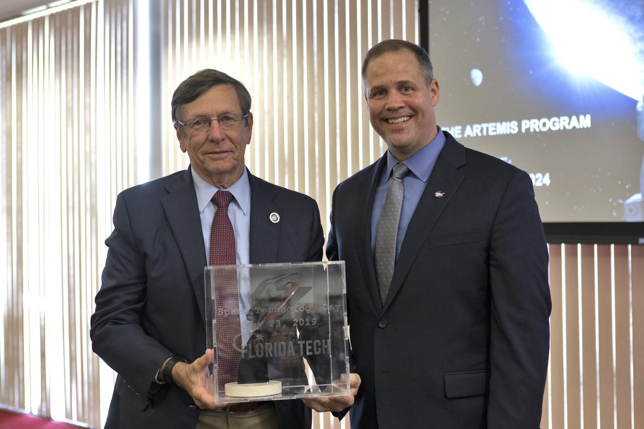 NASA Administrator Jim Bridenstine, right, poses with Florida Institute of Technology President T. Dwayne McCay on Thursday, May 23, 2019 at the Melbourne, FL campus. Bridenstine delivered the keynote address during the university’s Space Technology Day. Among the key topics Bridenstine discussed was NASA’s Artemis missions to the Moon, including the lunar Gateway, which will serve as an orbiting outpost for astronauts.