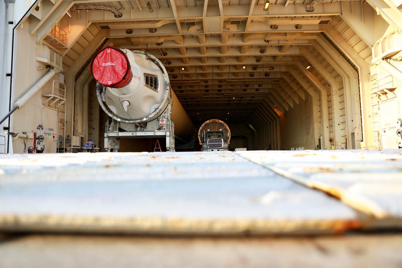 At the Army Wharf at Cape Canaveral Air Force Station in Florida, the United Launch Alliance (ULA) Mariner cargo ship door is lowered on June 5, 2019, for offloading of the ULA Atlas V booster that will be used for Boeing’s Crew Flight Test (CFT). The Atlas V rocket will launch the CST-100 Starliner spacecraft and its crew, NASA astronauts Mike Fincke and Nicole Mann and Boeing astronaut Chris Ferguson, to the International Space Station for NASA’s Commercial Crew Program. The booster will be transported to the Atlas Spaceflight Operations Center to await the start of operations for its mission. The CFT will demonstrate Starliner and Atlas V’s ability to safely carry crew to and from the orbiting laboratory.