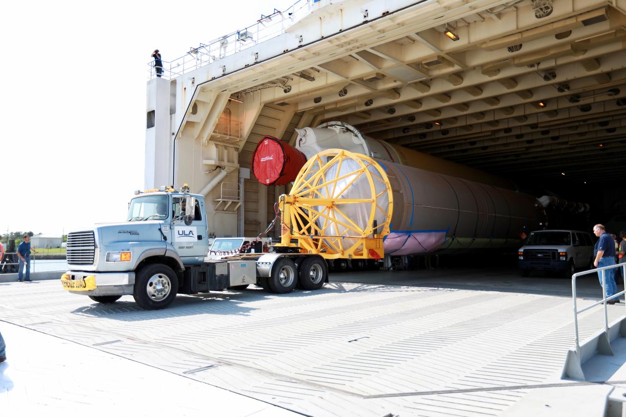 The United Launch Alliance (ULA) Atlas V booster that will be used for Boeing’s Crew Flight Test (CFT) is moved out of the Mariner cargo ship at the Army Wharf at Cape Canaveral Air Force Station in Florida on June 5, 2019. The ULA Atlas V rocket will launch the CST-100 Starliner and its crew, NASA astronauts Mike Fincke and Nicole Mann and Boeing astronaut Chris Ferguson, to the International Space Station for NASA’s Commercial Crew Program. The booster will be transported to the Atlas Spaceflight Operations Center to await the start of operations for its missions. The CFT will demonstrate Starliner and Atlas V’s ability to safely carry crew to and from the orbiting laboratory.
