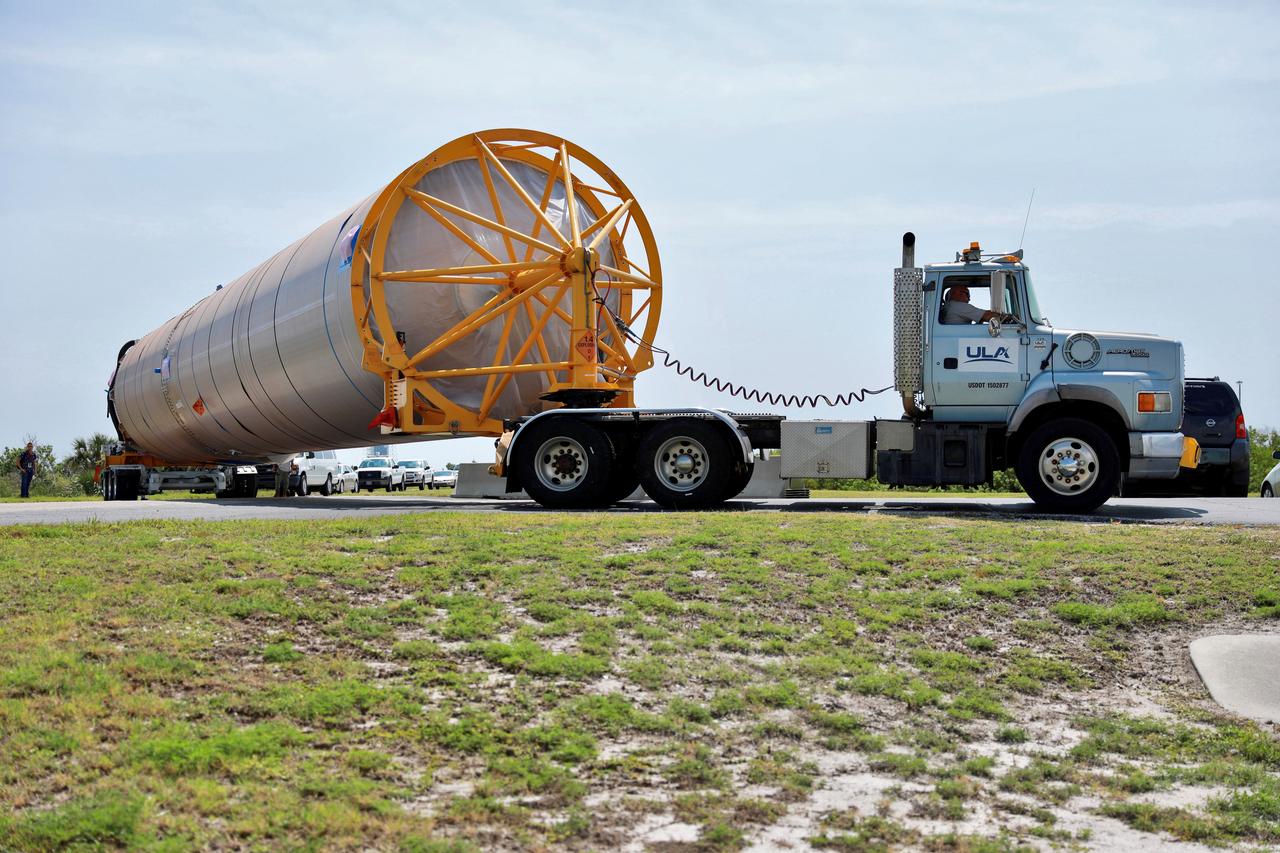 The United Launch Alliance (ULA) Atlas V booster that will be used for Boeing’s Crew Flight Test (CFT) nears the Atlas Spaceflight Operations Center (ASOC) at Cape Canaveral Air Force Station in Florida on June 5, 2019. The ULA Atlas V rocket will launch Starliner and its crew, NASA astronauts Mike Fincke and Nicole Mann and Boeing astronaut Chris Ferguson, to the International Space Station for NASA’s Commercial Crew Program. Inside the ASOC, the booster will await the start of operations for its missions. The CFT will demonstrate Starliner and Atlas V’s ability to safely carry crew to and from the orbiting laboratory.