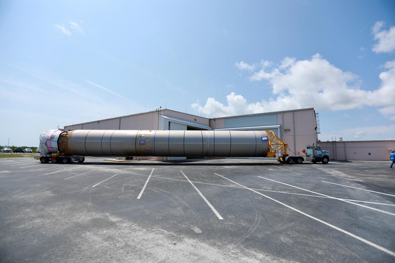 The United Launch Alliance (ULA) Atlas V booster that will be used for Boeing’s Crew Flight Test (CFT) nears the Atlas Spaceflight Operations Center (ASOC) at Cape Canaveral Air Force Station in Florida on June 5, 2019. The ULA Atlas V rocket will launch Starliner and its crew, NASA astronauts Mike Fincke and Nicole Mann and Boeing astronaut Chris Ferguson, to the International Space Station for NASA’s Commercial Crew Program. Inside the ASOC, the booster will await the start of operations for its missions. The CFT will demonstrate Starliner and Atlas V’s ability to safely carry crew to and from the orbiting laboratory.