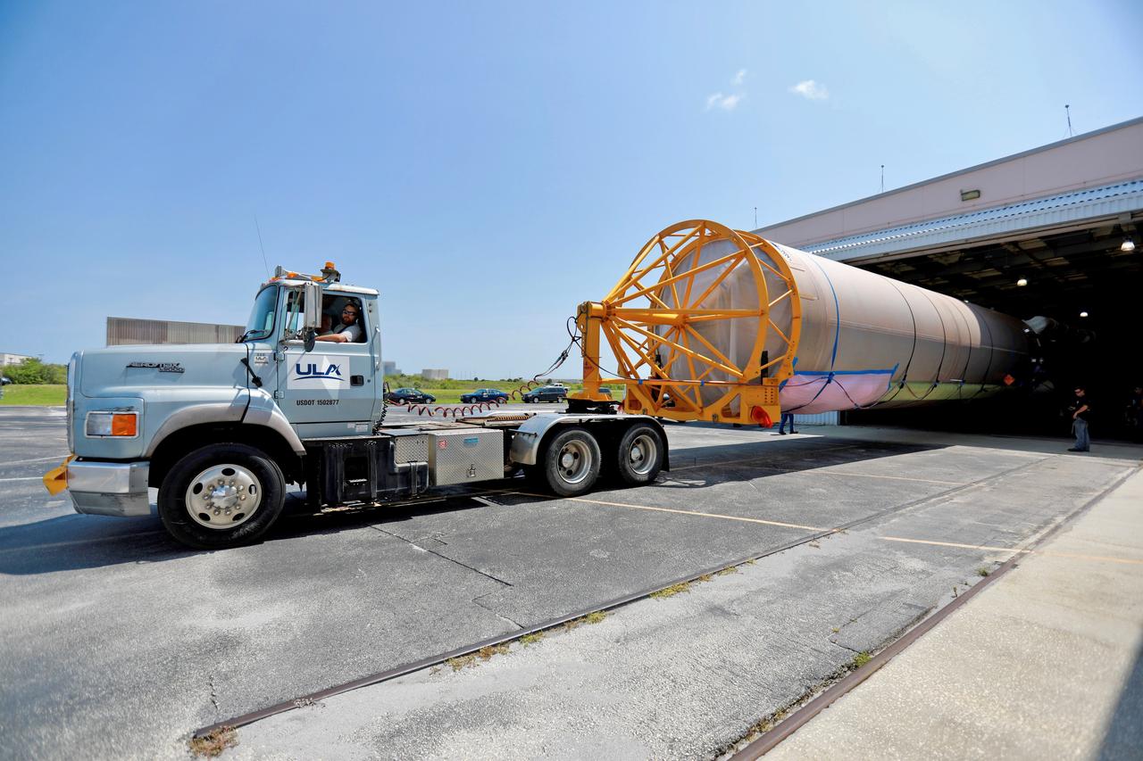 The United Launch Alliance (ULA) Atlas V booster that will be used for Boeing’s Crew Flight Test (CFT) is backed into the Atlas Spaceflight Operations Center (ASOC) at Cape Canaveral Air Force Station in Florida on June 5, 2019. The ULA Atlas V rocket will launch Starliner and its crew, NASA astronauts Mike Fincke and Nicole Mann and Boeing astronaut Chris Ferguson, to the International Space Station for NASA’s Commercial Crew Program. Inside the ASOC, the booster will await the start of operations for its missions. The CFT will demonstrate Starliner and Atlas V’s ability to safely carry crew to and from the orbiting laboratory.