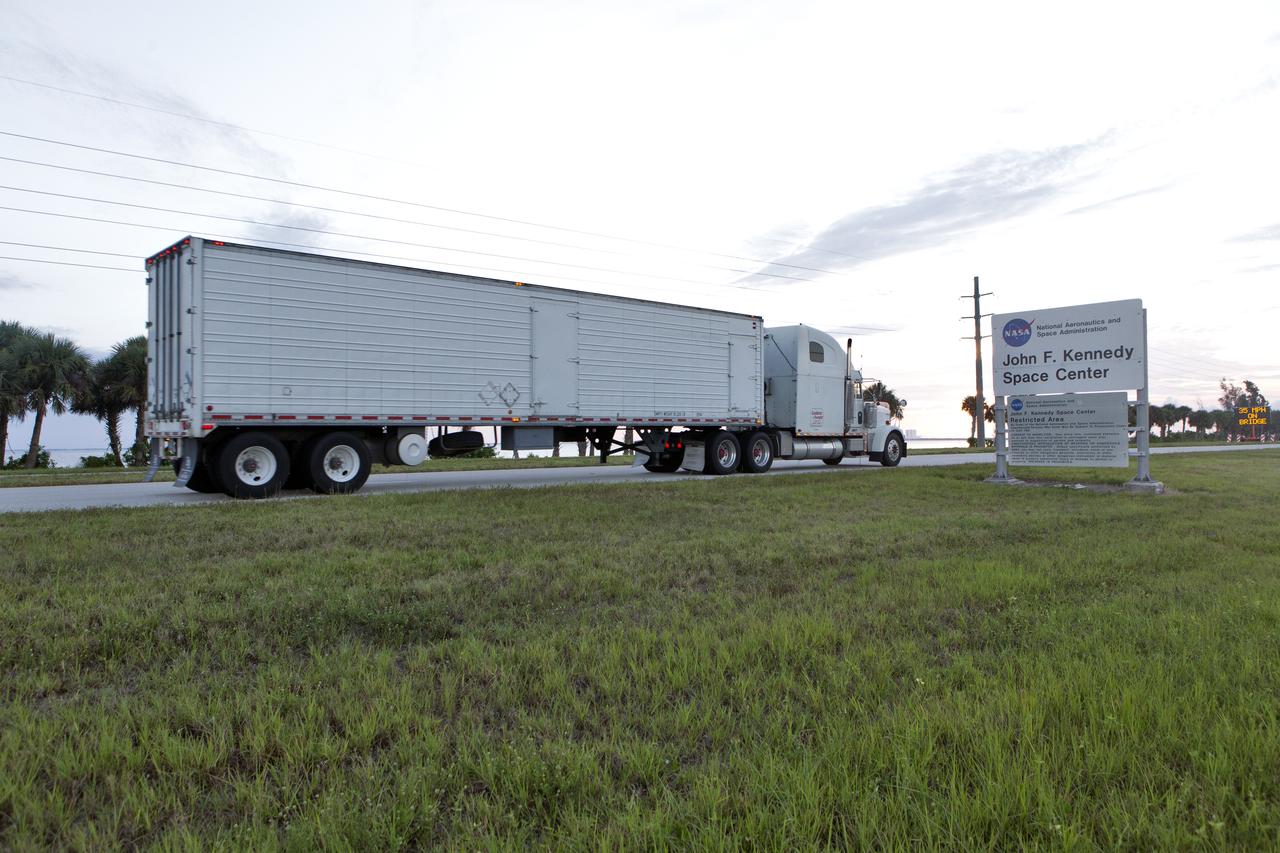 The abort motor for NASA’s Artemis 1 mission, secured in a heavy transport truck, arrives at the entrance to the agency’s Kennedy Space Center in Florida on June 6, 2019. The abort motor, manufactured by Northrop Grumman, will be delivered to the Launch Abort System Facility and integrated with Orion subcomponents and prepared for Artemis 1. It is one of three motors located on the tower of the Launch Abort System (LAS). The LAS is designed to pull the Orion capsule and its crew away to safety if an emergency occurs during ascent of the Space Launch System (SLS) rocket. During Artemis 1, the uncrewed Orion spacecraft will launch atop the SLS from Launch Pad 39B at Kennedy. Orion will embark on an approximately three-week mission that will take the spacecraft thousands of miles past the Moon. Orion will return to Earth and splashdown in the Pacific Ocean off the coast of California, where it will be retrieved and returned to Kennedy.